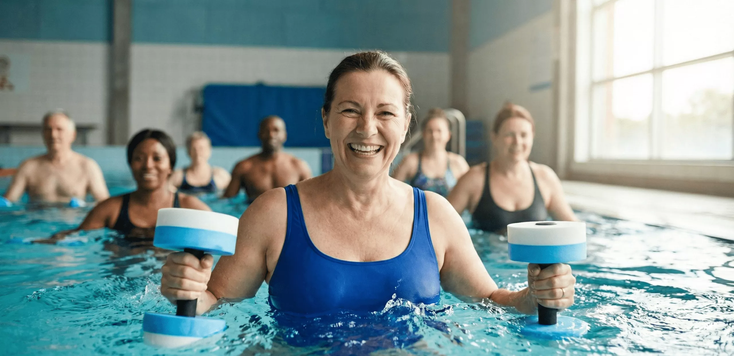 Femme pendant une séance d'Aquagym chez Forest Hill heureuse