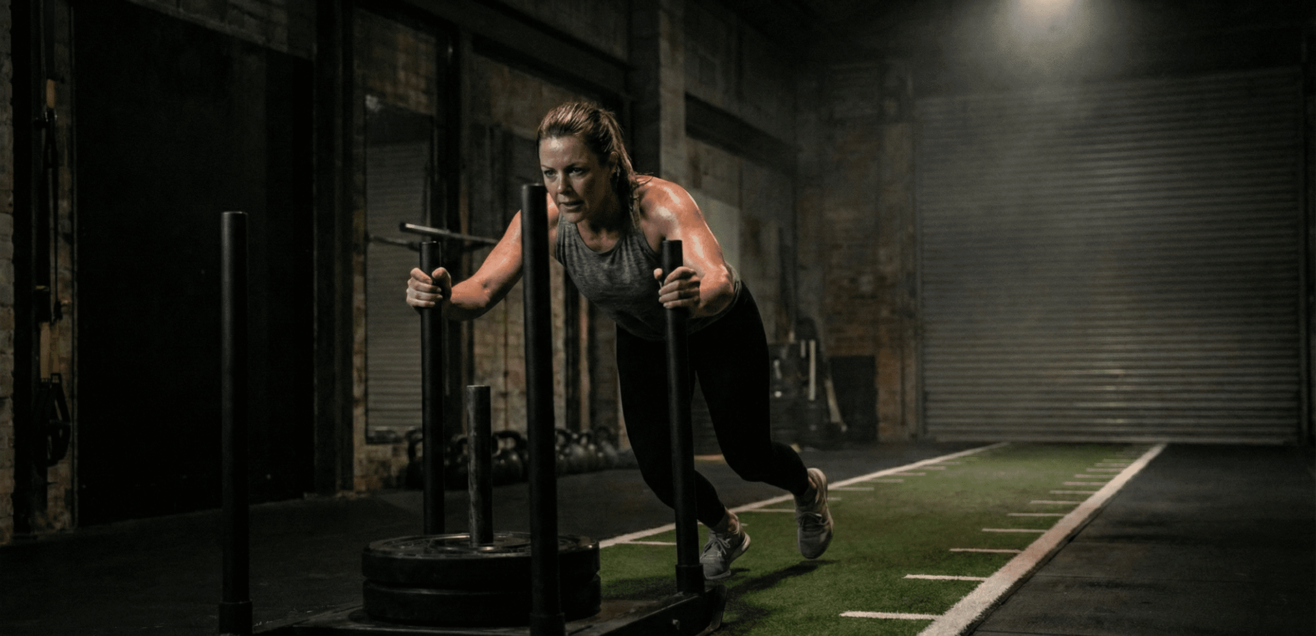 Femme pendant un entrainement d'Hyrox Paris Forest Hill